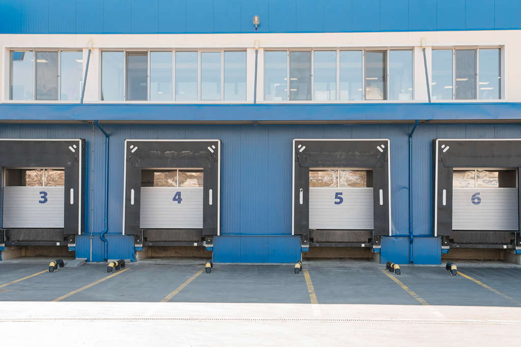 Long-distance moving truck parked at a storage facility
