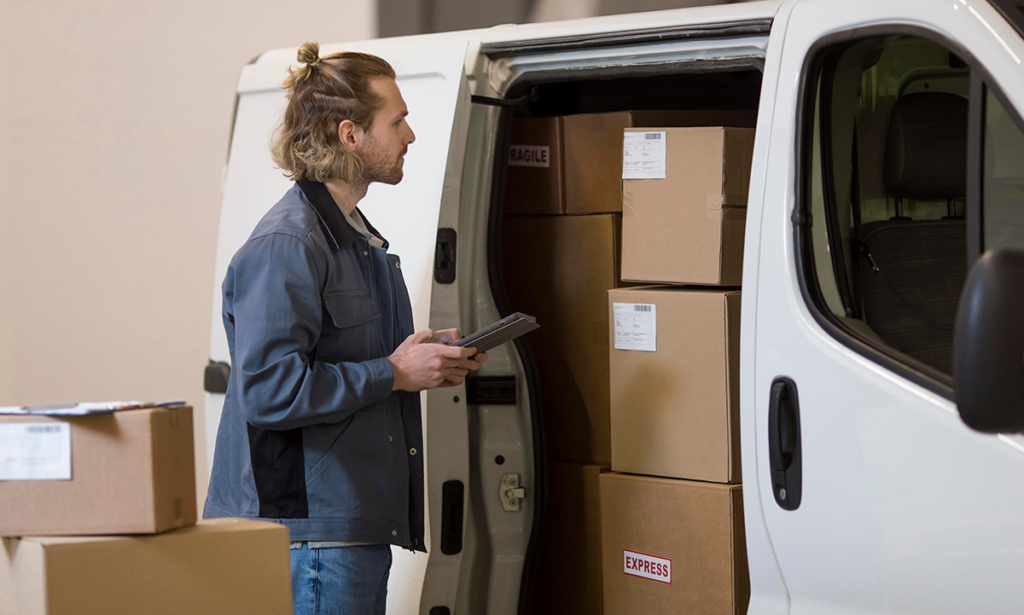 Professional movers loading furniture onto a truck