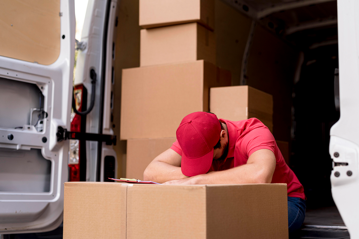 Image of a moving truck loaded with boxes and furniture